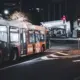 Commercial Bus Wrap Driving Through Salt Lake City at Night